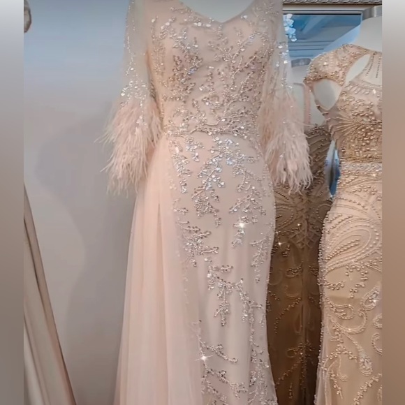 Couture dress. Stunning with tons of sequins and feathers. Worn once. - Picture 6 of 6